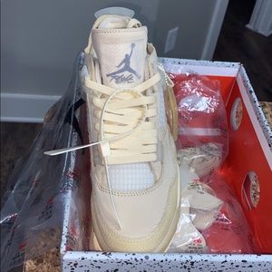 Women’s off white Jordan 4s